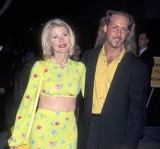Beth and first husband, Brian Porizek attending an event together